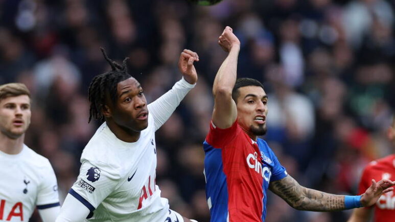 Daniel Munoz competes for the ball with Destiny Udogie as Tottenham play Crystal Palace
